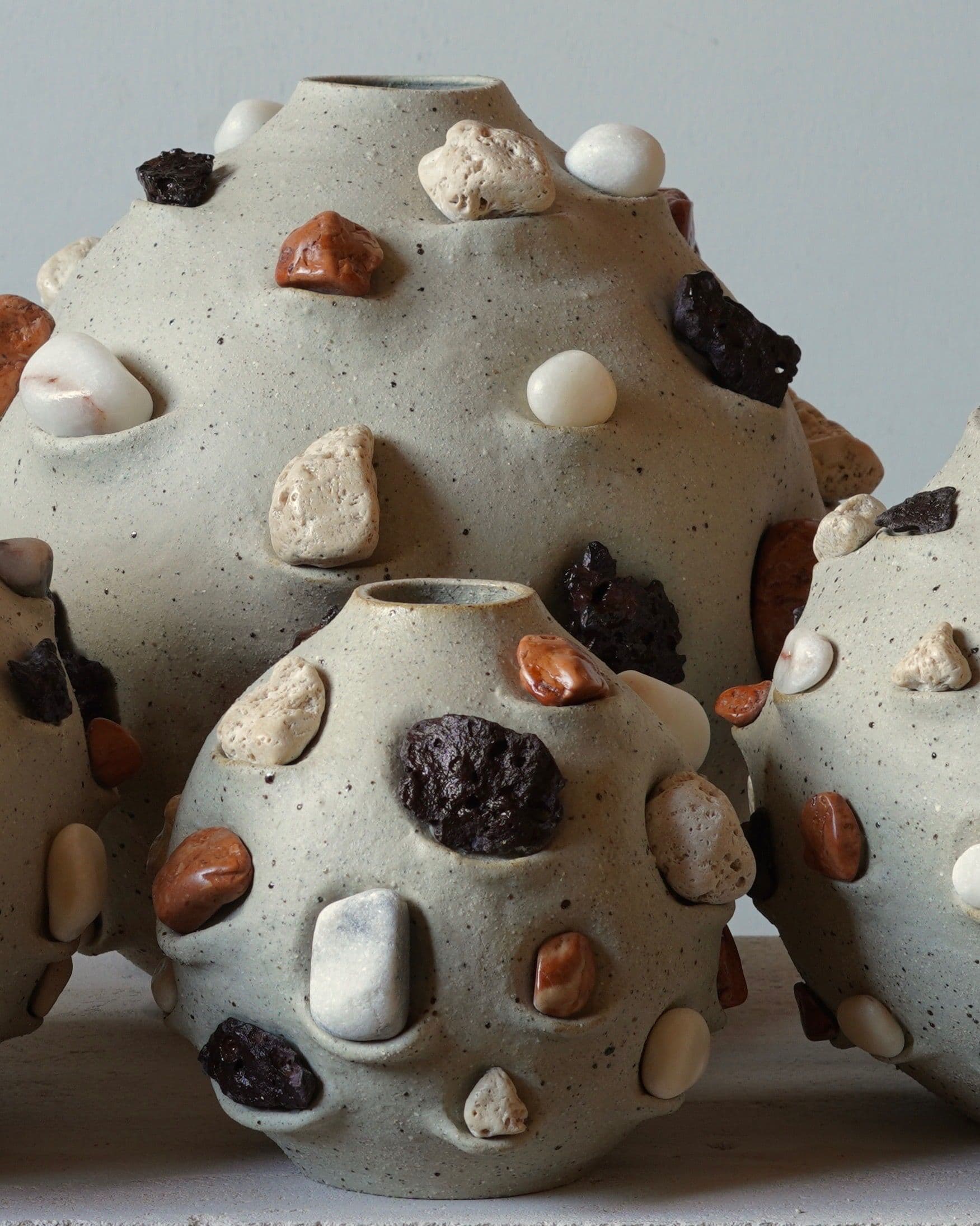 Rock cycle vessels by Claire Ellis.