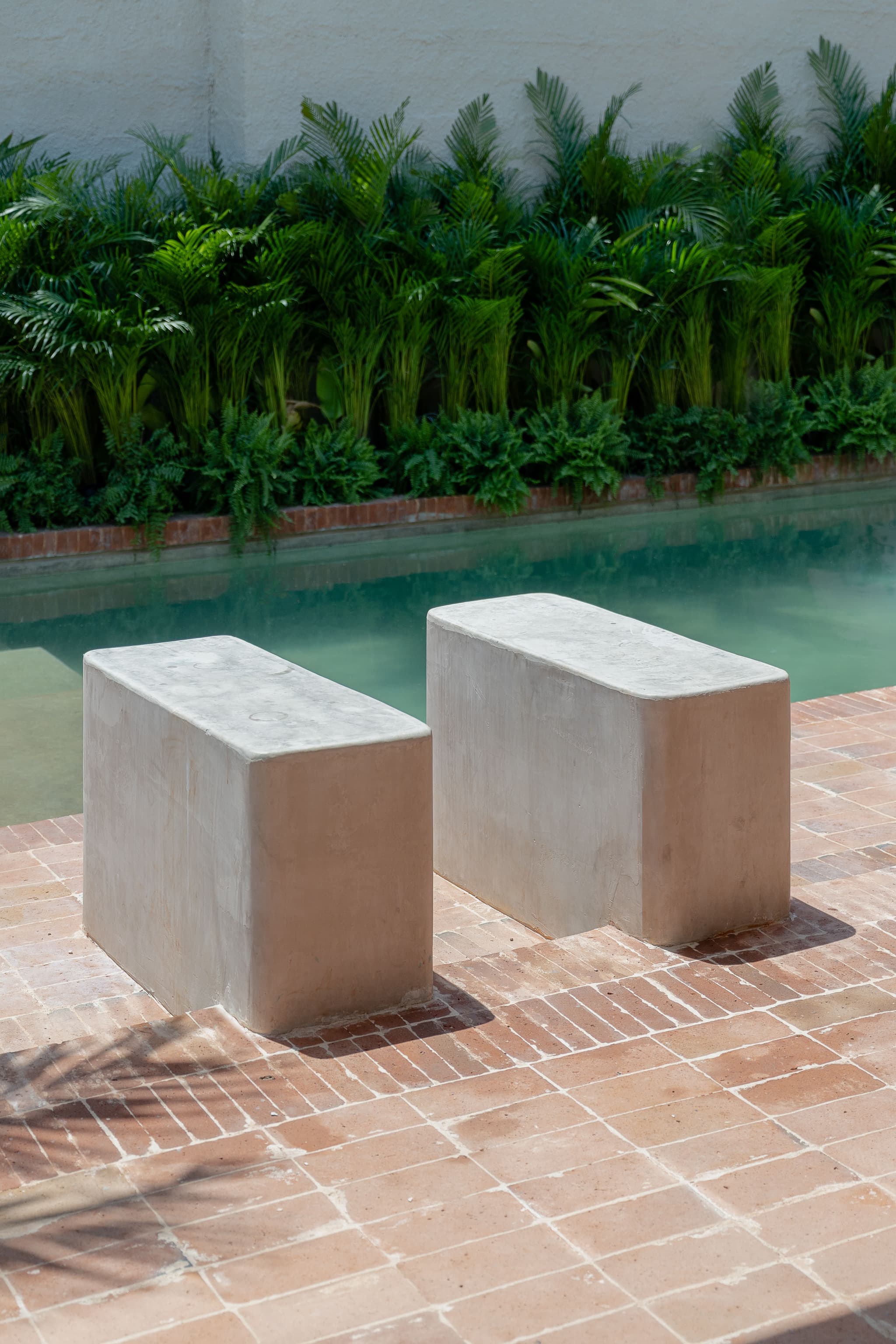 La Posmoderna (2023) by FMT Estudio. Preserving the residence’s character, ironwork windows, columns and architectural elements were preserved. This blend of old and new maintains historical integrity.