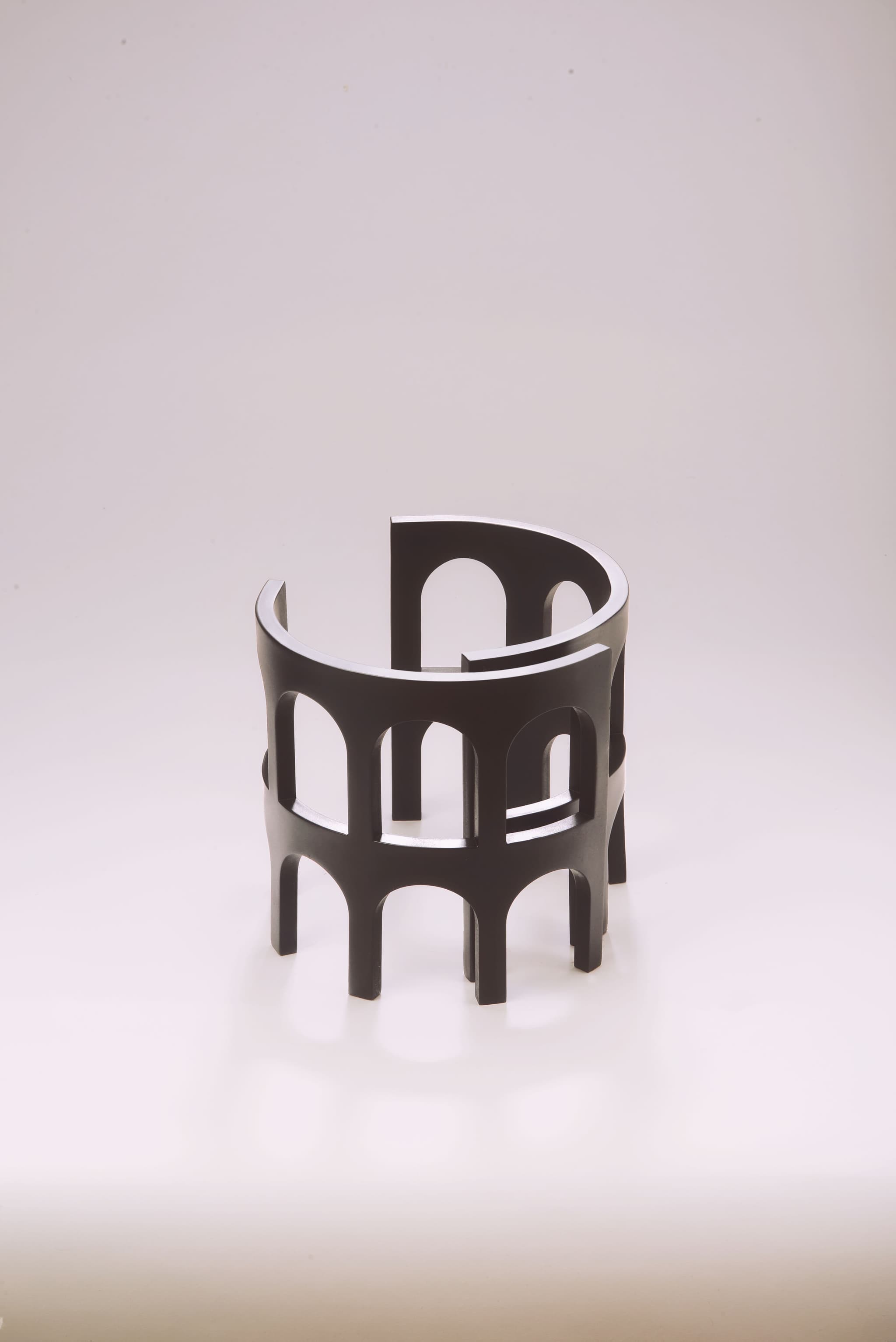 Italic small cast iron by Claudio Larcher. Inspired by the ruins of Ancient Rome, it reproduces the landscape through its architecture. Photo courtesy of Rampinelli Edizioni.