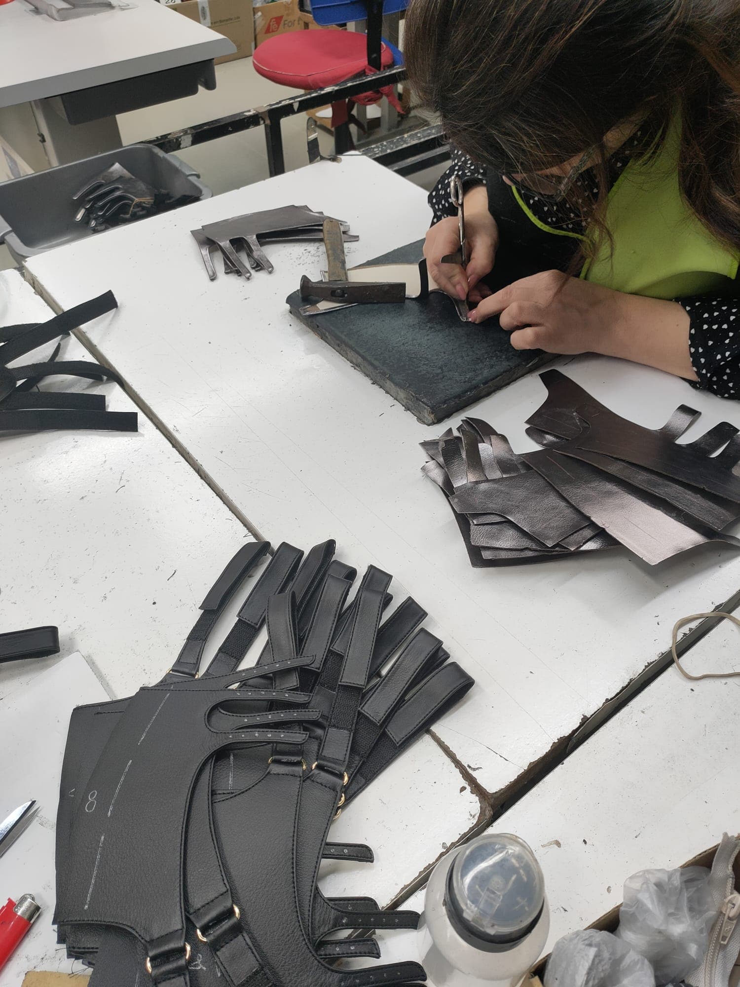 NUJOU prioritizes responsible sourcing through certified European tanneries and upcycled leathers, highlighting the durability and sensory experience of natural leather without plastics.