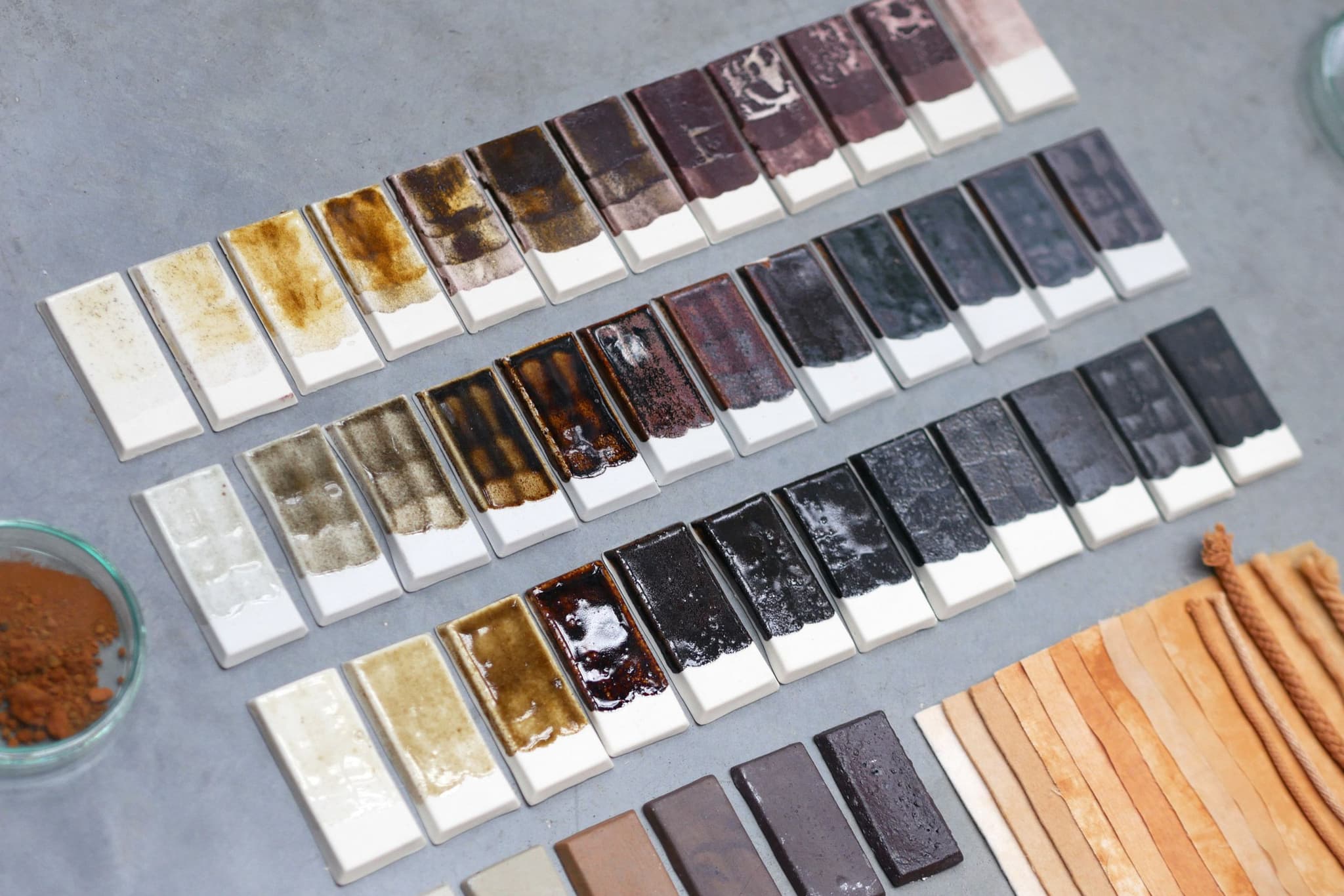 Agne Kucerenkaite's color research for ceramic tiles uses metal waste for diverse glaze colors.